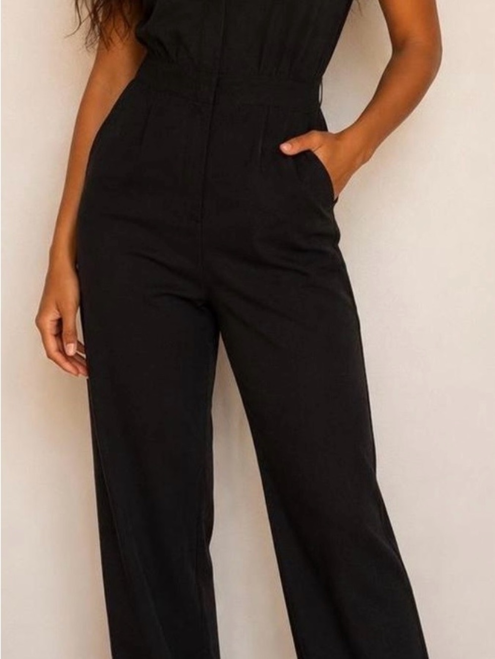 Atwyld Black Short-Sleeve Zip-Front Jumpsuit Size S-M. More on the Small size.